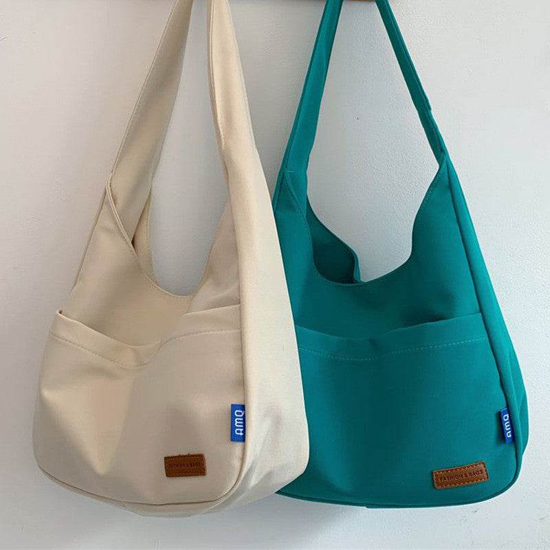 Fashion Casual Embroidered Tooling Canvas Messenger Bag - MYLUXURY LANE ENTERPRISE
