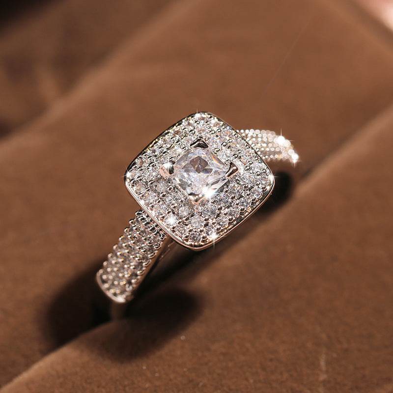 Classic Four-claw Round Zircon Engagement Ring - MYLUXURY LANE ENTERPRISE