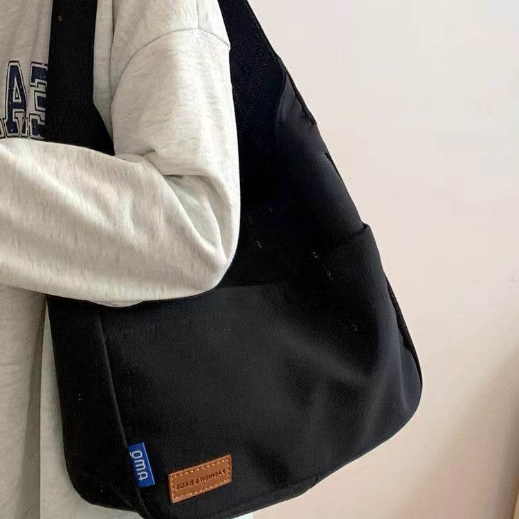 Fashion Casual Embroidered Tooling Canvas Messenger Bag - MYLUXURY LANE ENTERPRISE
