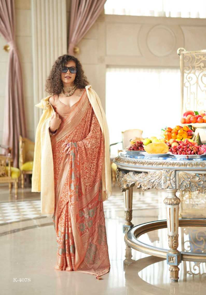Woman in a saree with sunglasses in a decorated room