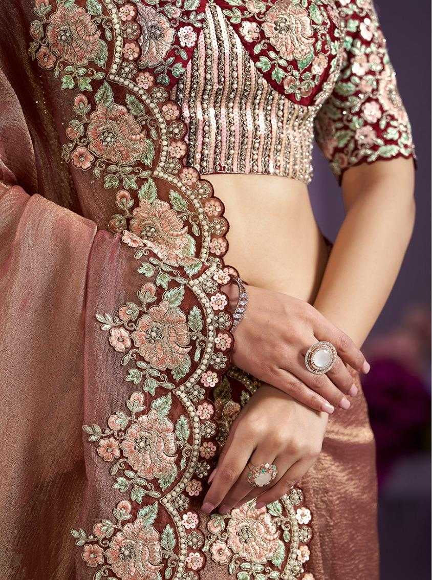 Traditional embroidered outfit with a close-up of floral patterns and a full-body view against a purple background.